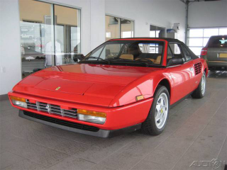Illustration for article titled Nice Price Or Crack Pipe: 5,944-Mile Ferrari Mondia Cabriolet For $37,995?